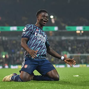 Saka Scores Thriller: Arsenal's Triumphant 3-1 Victory Over Norwich City in the Premier League (2021-22)