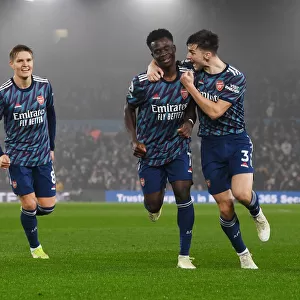 Saka and Tierney Celebrate Arsenal's Third Goal vs Leeds United (2021-22)