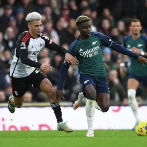 Saka vs Robinson: A Battle of Wits at Craven Cottage - Fulham vs Arsenal, Premier League 2023-24 Saka vs Robinson: A Battle of Wits at Craven Cottage - Fulham vs Arsenal, Premier League 2023-24