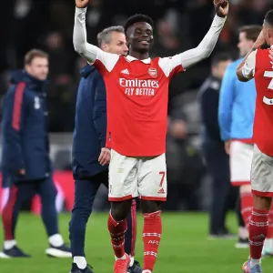 Saka's Celebration: Arsenal's Victory Over Tottenham in the Premier League (2022-23) Saka's Celebration: Arsenal's Victory Over Tottenham in the Premier League (2022-23)