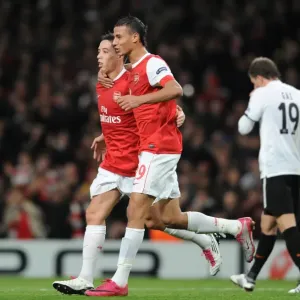 Sami Nasri celebrates scoring the 2nd Arsenal goal with Marouane Chamakh