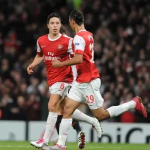Sami Nasri and Marouane Chamakh: Celebrating Arsenal's 5-1 Victory Over Shakhtar Donetsk in the Champions League