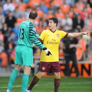 Print of Samir Nasri and Jens Lehmann in action Print of Samir Nasri and Jens Lehmann in action
