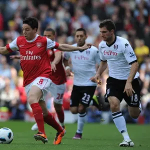 Samir Nasri (Arsenal) Aaron Hughes (Fulham). Fulham 2: 2 Arsenal, Barclays Premier League