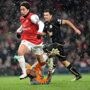 Samir Nasri (Arsenal) Ali Al Habsi (Wigan). Arsenal 2: 0 Wigan Athletic