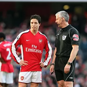 Samir Nasri (Arsenal) chats to Referee Chris Foy. Arsenal 3: 1 Burnley. Barclays Premier League