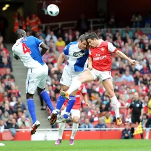 Samir Nasri (Arsenal) clashes heads with Ryan Nelson (Blackburn). Arsenal 0