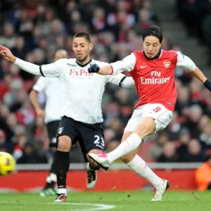 Samir Nasri (Arsenal) Clint Dempsey (Fulham). Arsenal 2: 1 Fulham. Barclays Premier League Samir Nasri (Arsenal) Clint Dempsey (Fulham). Arsenal 2: 1 Fulham. Barclays Premier League