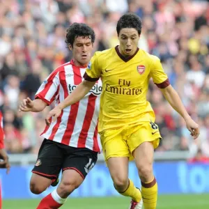 Print of Samir Nasri and Cristian Riveros in action