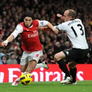 Samir Nasri (Arsenal) Danny Murphy (Fulham). Arsenal 2: 1 Fulham. Barclays Premier League Samir Nasri (Arsenal) Danny Murphy (Fulham). Arsenal 2: 1 Fulham. Barclays Premier League
