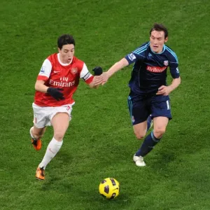 Samir Nasri (Arsenal) Dean Whitehead (Stoke). Arsenal 1: 0 Stoke City. Barclays Premier League