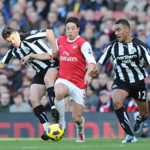 Samir Nasri (Arsenal) Joey Barton and Danny Simpson(Newcastle). Arsenal 0 Samir Nasri (Arsenal) Joey Barton and Danny Simpson(Newcastle). Arsenal 0