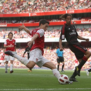 Samir Nasri (Arsenal) Luca Antonini (Milan). Arsenal 1: 1 AC Milan. Emirates Cup Pre Season