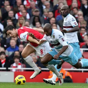 Samir Nasri (Arsenal) Luis Boa Morte and Henrita Ilunga (West Ham). Arsenal 1