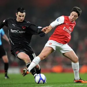 Samir Nasri (Arsenal) Matthew Spring (Orient). Arsenal 5: 0 Leyton Orient