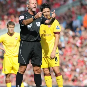 Samir Nasri (Arsenal) and referee Martin Atkinson. Liverpool 1: 1 Arsenal