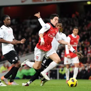 Samir Nasri beats Aaron Hughes, Dickson Etuhu and John Pantsil (Fulham) on his way to scoring his Samir Nasri beats Aaron Hughes, Dickson Etuhu and John Pantsil (Fulham) on his way to scoring his