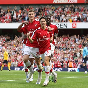 Samir Nasri celebrates scoring the Arsenal goal with Nicklas Bendtner