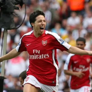 Samir Nasri celebrates scoring the Arsenal goal