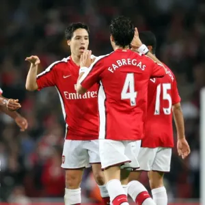 Samir Nasri celebrates scoring Arsenals 1st goal with Cesc Fabregas