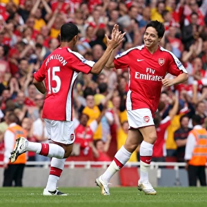 Samir Nasri celebrates scoring Arsenals goal with Denilson