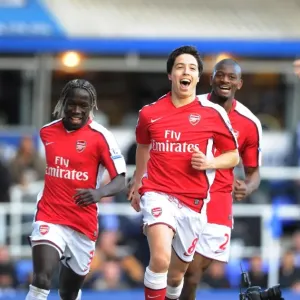 Samir Nasri celebrates scoring with teammates in print Samir Nasri celebrates scoring with teammates in print