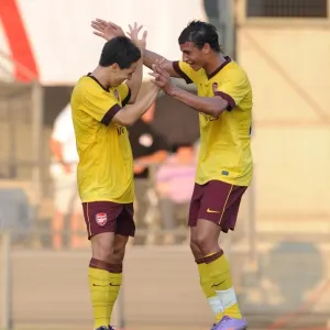 Samir Nasri and Marouane Chamakh: Celebrating Arsenal's Second Goal Against Sturm Graz (2010) Samir Nasri and Marouane Chamakh: Celebrating Arsenal's Second Goal Against Sturm Graz (2010)