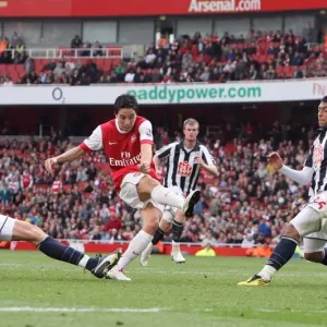Samir Nasri scores his and Arsenals 2nd goal past Scott carsona and Gonzalo Jara