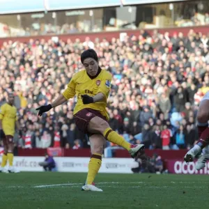 Samir Nasri scores Arsenals 2nd goal under pressure from Luke Young (Villa) Samir Nasri scores Arsenals 2nd goal under pressure from Luke Young (Villa)