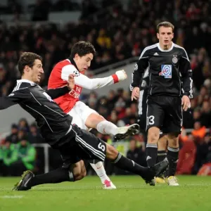 Samir Nasri scores Arsenals 3rd goal under pressure from Vojislav Stankovic Samir Nasri scores Arsenals 3rd goal under pressure from Vojislav Stankovic