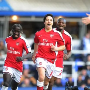 Samir Nasri shoots celebrates scoring the Arsenal goal with Bacary Sagna and Abou Diaby