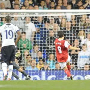 Samir Nasri shoots past Tottenham goalkeeper Stiope Pletikosa to score the 3rd Arsenal goal Samir Nasri shoots past Tottenham goalkeeper Stiope Pletikosa to score the 3rd Arsenal goal