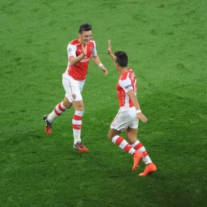 Sanchez and Ozil Celebrate Arsenal's Champions League Goals Against Galatasaray (2014) Sanchez and Ozil Celebrate Arsenal's Champions League Goals Against Galatasaray (2014)