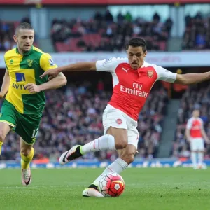Sanchez vs. Brady: A Premier League Showdown - Arsenal's Battle Against Norwich City (April 2016) Sanchez vs. Brady: A Premier League Showdown - Arsenal's Battle Against Norwich City (April 2016)