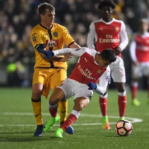 Sanchez vs. Collins: Arsenal's FA Cup Fifth Round Battle at Sutton United Sanchez vs. Collins: Arsenal's FA Cup Fifth Round Battle at Sutton United