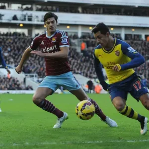 Sanchez vs. Tomkins: A Premier League Battle at Boleyn Ground