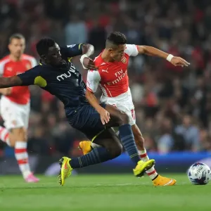 Sanchez vs. Wanyama: A Footballing Battle in Arsenal's League Cup Showdown Sanchez vs. Wanyama: A Footballing Battle in Arsenal's League Cup Showdown