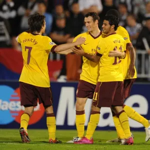 Sebastien Squillaci celebrates scoring the 3rd Arsenal goal with Tomas Rosicky