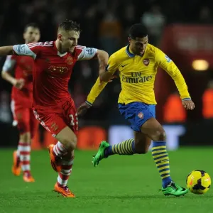 Serge Gnabry vs Luke Shaw: Intense Battle at Southampton's St Marys Stadium (Arsenal vs Southampton, Premier League 2013-14) Serge Gnabry vs Luke Shaw: Intense Battle at Southampton's St Marys Stadium (Arsenal vs Southampton, Premier League 2013-14)