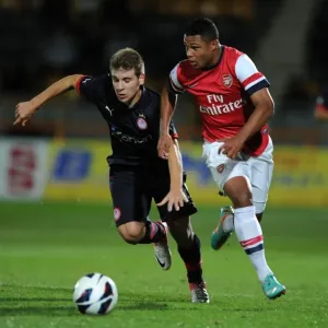 Serge Gnabry's Agile Moves: Outshining Dimitrios Voutsiotis in Arsenal U19's NextGen Series Match against Olympiacos Serge Gnabry's Agile Moves: Outshining Dimitrios Voutsiotis in Arsenal U19's NextGen Series Match against Olympiacos