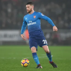 Shkodran Mustafi: Arsenal's Defender in Action Against Swansea City, Premier League 2017-18 Shkodran Mustafi: Arsenal's Defender in Action Against Swansea City, Premier League 2017-18