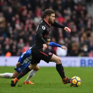 Shkodran Mustafi Focuses in Arsenal's Premier League Clash Against Brighton & Hove Albion