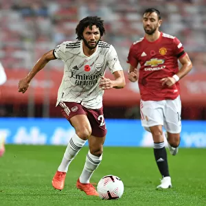Silent Warrior at Old Trafford: Mo Elneny's Battle in Empty Premier League Stands (Manchester United vs. Arsenal, 2020-21)