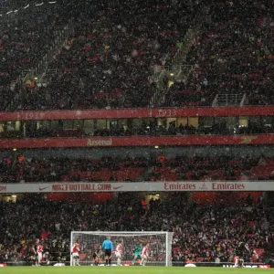 Snow falls across the Clock End during the match. Arsenal 2: 0 Wigan Athletic