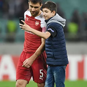 Sokratis Celebrates with Arsenal Fan after Qarabag Victory, Europa League 2018-19