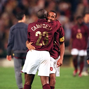 Sol Campbell and Thierry Henry (Arsenal) celebrate at the end of the match
