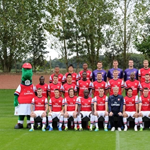 ST ALBANS, ENGLAND - SEPTEMBER 20: Arsenal Squad 2013 / 14 with Gunnersaurus at London