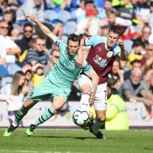 Stephan Lichtsteiner vs Johann Berg Gudmundsson: Intense Clash Between Burnley and Arsenal in Premier League