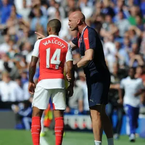 Steve Bould Coaches Theo Walcott: Arsenal's Assistant Manager Gives Instructions During Chelsea vs. Arsenal (2015-16 Premier League) Steve Bould Coaches Theo Walcott: Arsenal's Assistant Manager Gives Instructions During Chelsea vs. Arsenal (2015-16 Premier League)