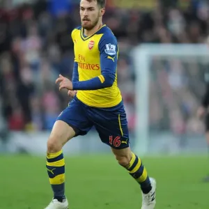 STOKE ON TRENT, ENGLAND - DECEMBER 06: Aaron Ramsey of Arsenal during the Barclays Premier League match between Stoke STOKE ON TRENT, ENGLAND - DECEMBER 06: Aaron Ramsey of Arsenal during the Barclays Premier League match between Stoke